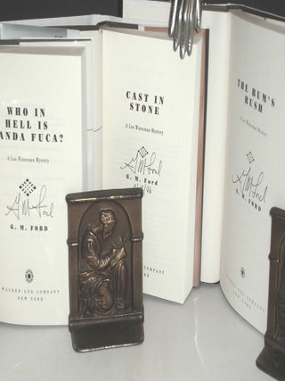 Who in Hell is Wanda Fuca?; Cast in Stone and The Bum's Rush (author's First, Second and Third Book, each signed)