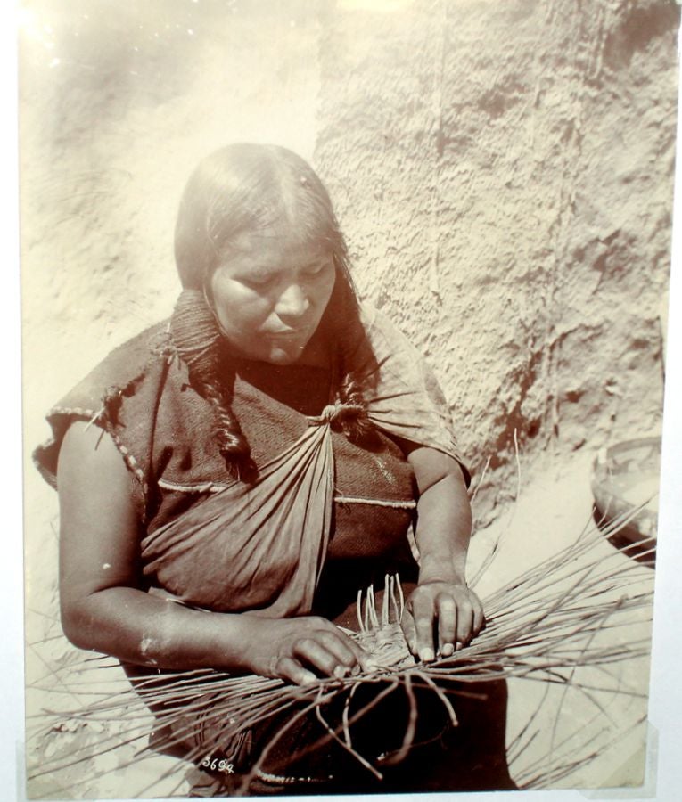 Item #021458 Woman of Oraibi Weaving a Basket Tray. Charles Chester Pierce.