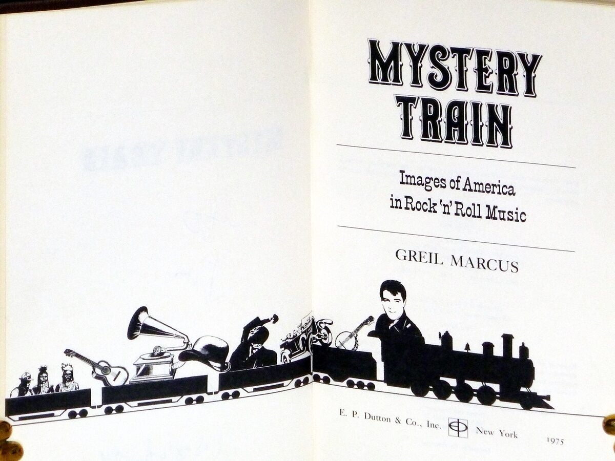 Mystery Train; Images of Rock N' Roll Music inscribed by the